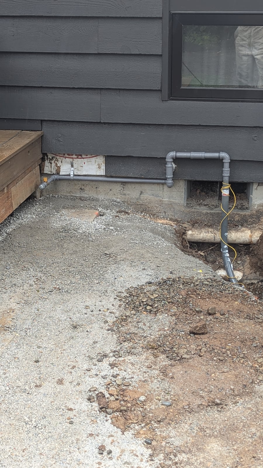 Underground gas line connected to residential home foundation by Puget Sound Gas