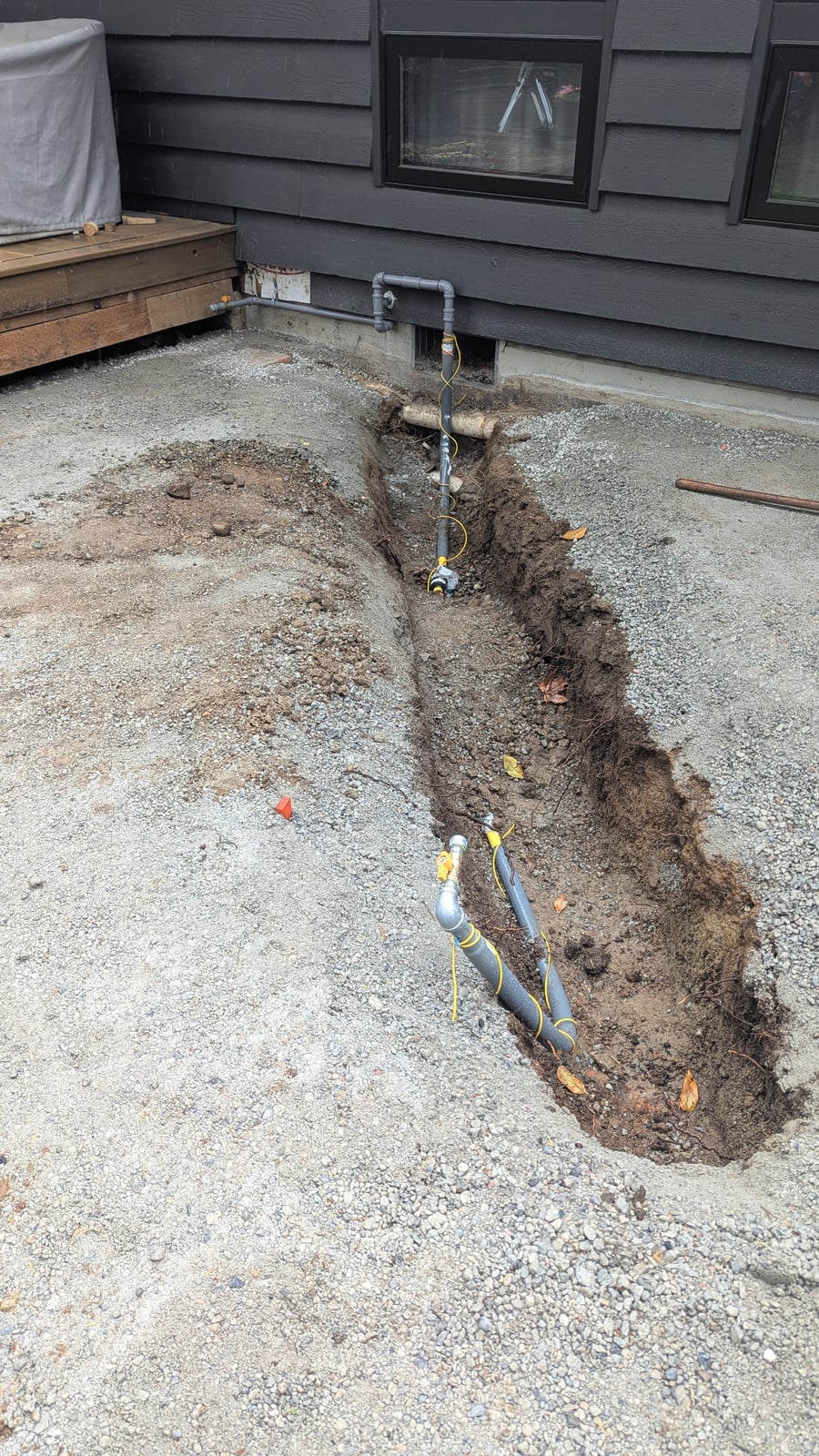 Underground gas line trench installation by Puget Sound Gas in Western Washington